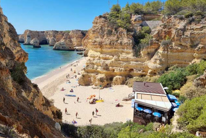 Marinha Beach, Atlantic coast in Caramujeira, Portugal